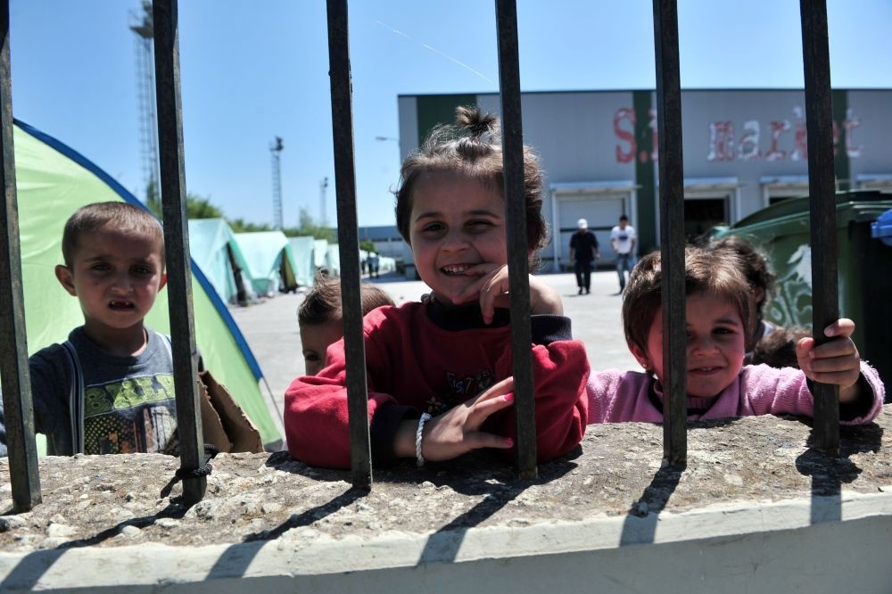 Children inside a new refugee camp in an abandoned factory in Sindos, a west suburb of Thessaloniki, May 27. 