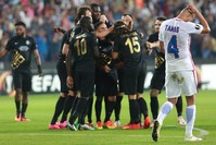 Steaua Bucharest's Gabriel Tamas reacts as Osmanlu0131spor's players celebrate their second goal during the match at Osmanlu0131 Stadium, Ankara, Turkey on September 15, 2016. (AFP Photo)