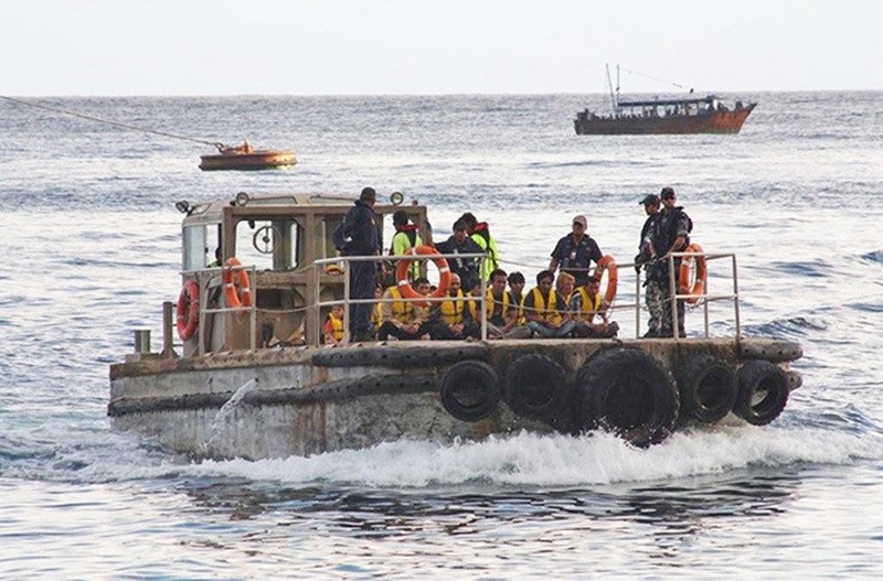 A boat carrying asylum seekers arrives at Christmas Island, Australia, 28 June 2012. (EPA Photo)
