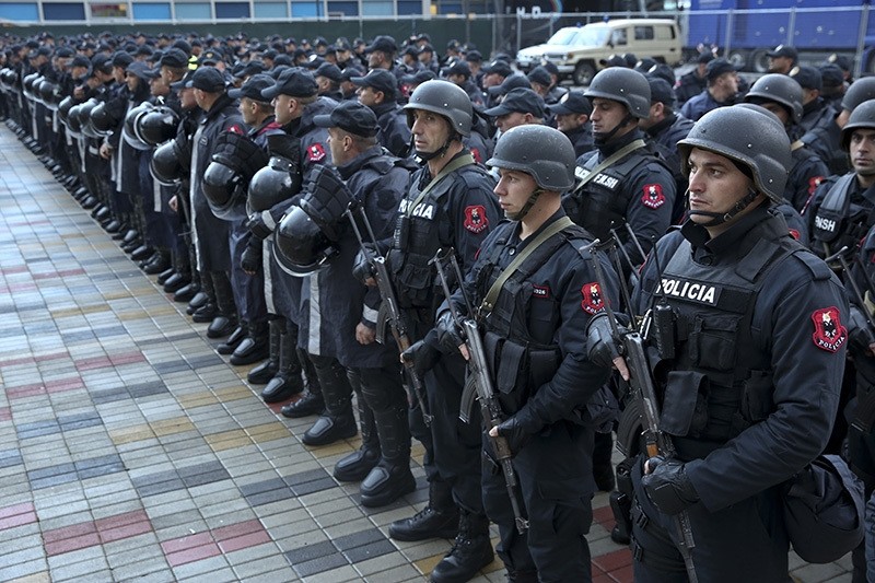 In this Saturday, Nov. 12, 2016 file photo, Albanian police forces line up in front of Elbasan Arena stadium where Albania will play their World Cup 2018 qualifying soccer match against Israel under tight security measures. (AP Photo)