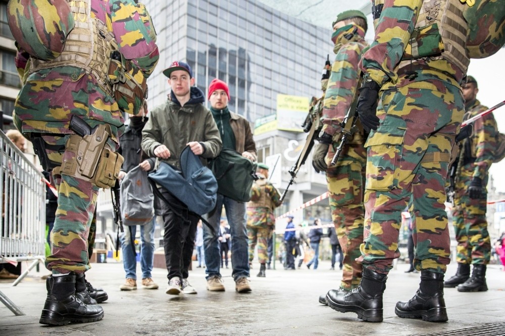 Belgian soldiers are guarding key sites across Brussels. 