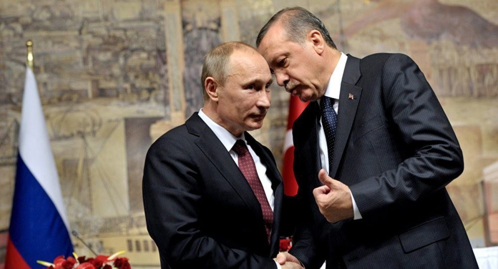 Russian President Putin speaking with the then Prime Minister Erdou011fan in 2013.