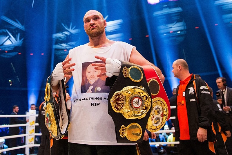 Tyson Fury celebrating in the ring after his victory over Ukraine's Vladimir Klitschko in their world heavyweight title bout in Duesseldorf, Germany, Nov. 28, 2015. (EPA Photo)