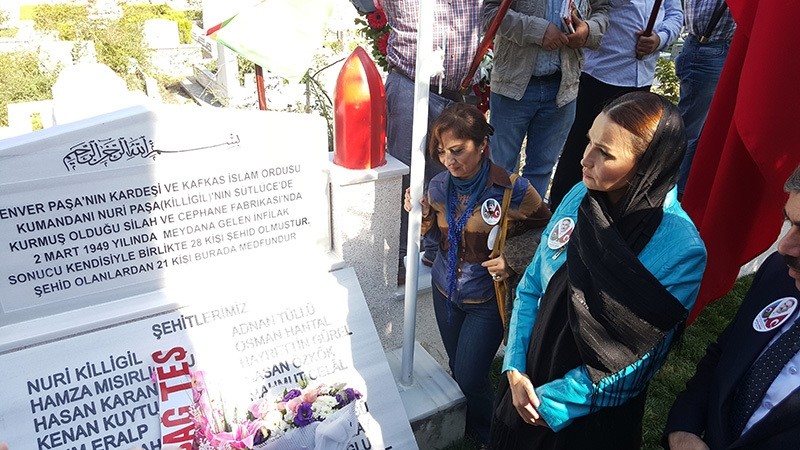 Azerbaijani MP Ganire Pau015fayeva stands next to Nuri Killigil's grave in Edirnekapu0131 Cemetery, Sept. 29, 2016. (IHA Photo)