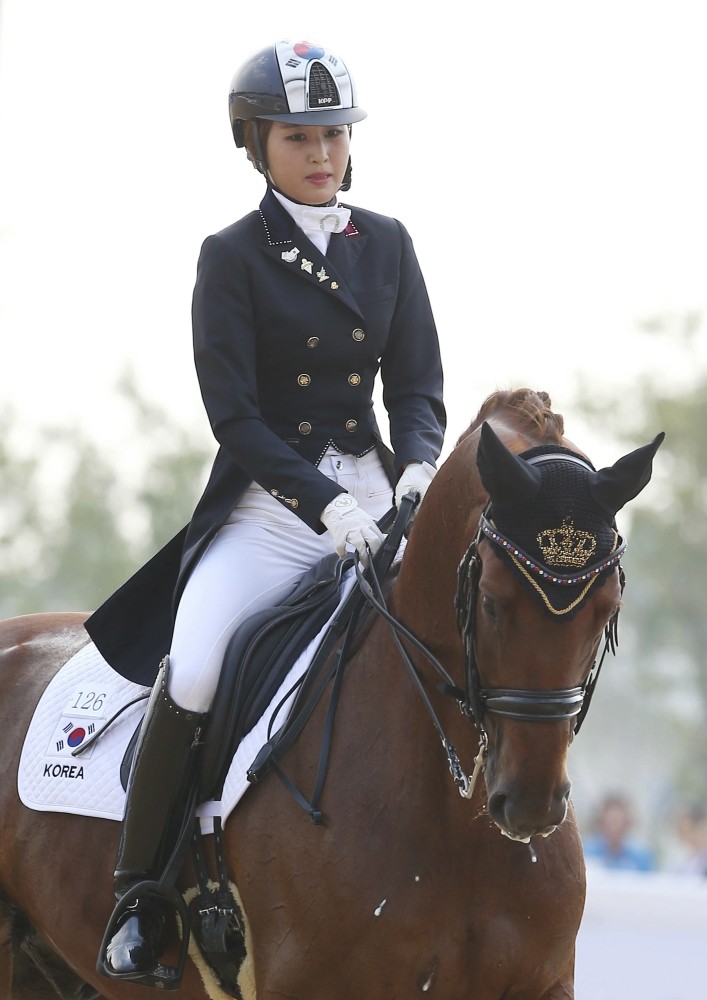 South Koreau2019s Chung Yoo-ra, the daughter of Choi Soon-sil, the confidante of disgraced President Park Geun-hye, competes during the equestrian dressage team competition for the 17th Asian Games in Incheon, South Korea, on Sept. 20, 2014.
