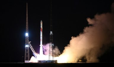 China launches 3 satellites into space from sea