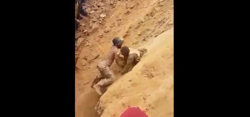 TRAPPED MINERS IN EAST CONGO TUMBLE OUT OF RUBBLE INTACT IN VIRAL VIDEO