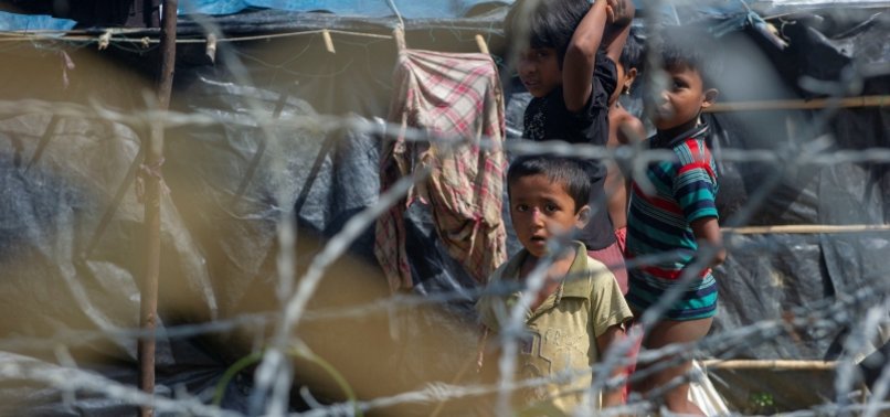SCORES OF ROHINGYA MUSLIMS FLEE PERSECUTION IN INDIA TO BANGLADESH