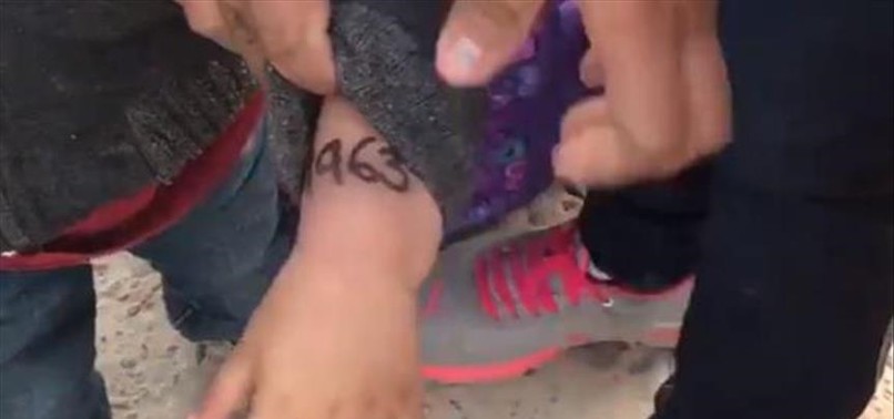 VIDEO SHOWING MIGRANT CHILDREN MARKED WITH NUMBERS ON THEIR ARMS AT US-MEXICO BORDER SPARKS OUTCRY
