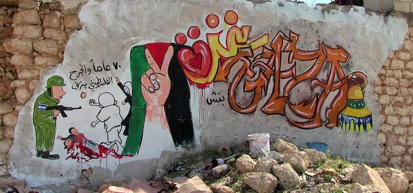 GRAFFITI ARTIST IN SYRIA’S IDLIB SHOWS SUPPORT FOR GAZA