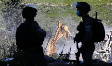Israeli forces demolish Palestinian homes, arrest dozens in West Bank