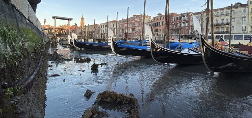 EXCEPTIONALLY LOW TIDES LEAVE VENICES CANALS ALMOST DRY