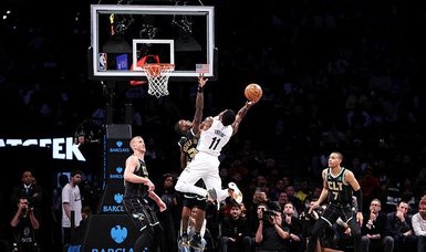 Kyie Irving (33 points), Nets fend off pesky Hornets