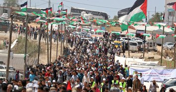 Thousands of Palestinian protesters mark anniversary of Nakba Day