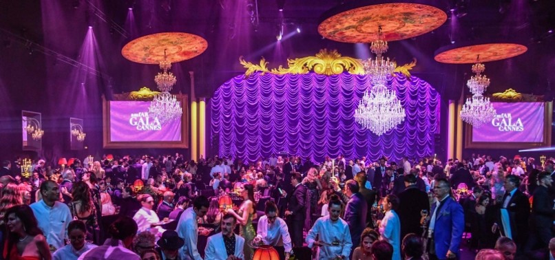 STARS AT CANNES RAISE $15M FOR AIDS RESEARCH