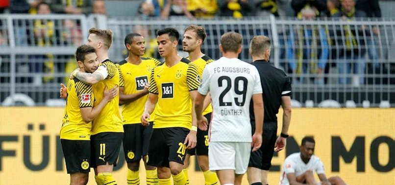 WASTEFUL DORTMUND BEAT 2-1 AUGSBURG TO MOVE INTO SECOND PLACE