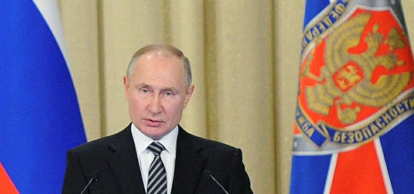 PUTIN ACCUSES WEST OF WANTING TO SHACKLE RUSSIA