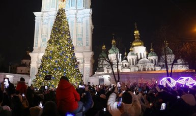 Russians show support for Palestinians, place Christmas trees near Palestinian Embassy in Moscow