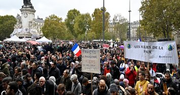 Thousands of Parisians march against Islamophobia after mosque shooting