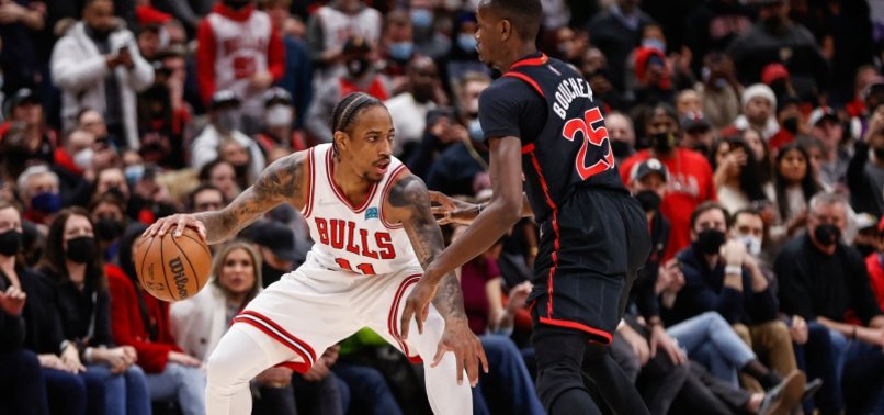 DEMAR DEROZAN, BULLS HOLD OFF RAPTORS