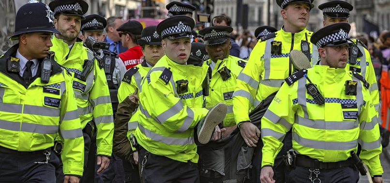 BRITISH POLICE ARREST NEARLY 1000 IN CLIMATE CHANGE PROTESTS