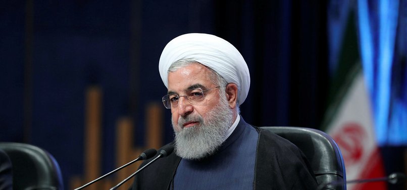 IRAN PRESIDENT WARNS OF PROBLEMS AS TRUMP DECISION LOOMS