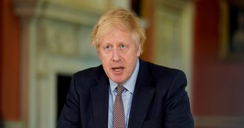 UK PM Johnson faces growing rebellion over aide's lockdown trip