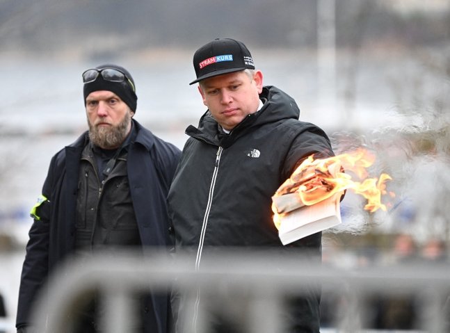 Danish far-right leader Rasmus Paludan burns copy of Quran in Swedish capital Stockholm