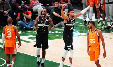 Giannis Antetokounmpo gets 50, Khris Middleton comes up clutch for champion Bucks