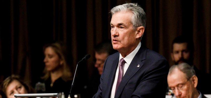 FED CHAIRMAN SAYS US ECONOMY HEALTHY, HINTS AT SLOWER RATE HIKES