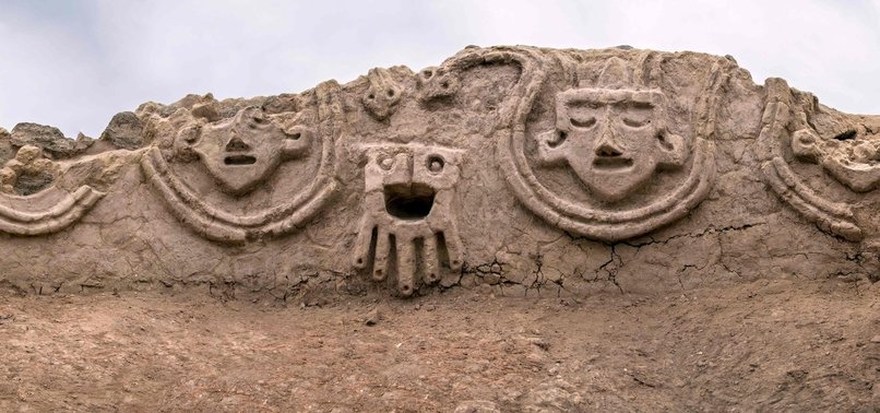 3,800-YEAR-OLD WALL RELIEF OF HEADS, SNAKES DISCOVERED IN PERU