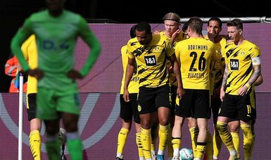 Haaland double gives Dortmund hope of top four finish