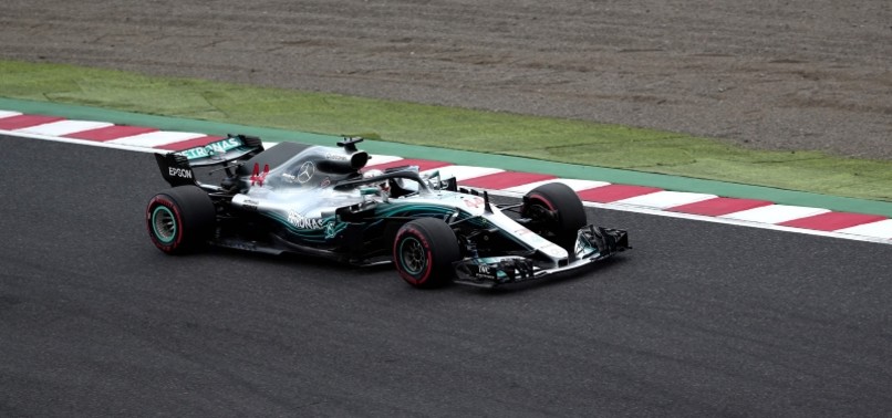 HAMILTON ROARS TO POLE POSITION FOR JAPANESE GRAND PRIX