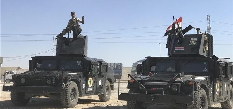 IRAQI GOVERNMENT TROOPS SURROUND MOSUL, AWAIT ORDERS