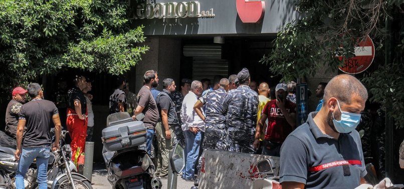ARMED MAN, DEMANDING FROZEN ASSETS, TAKES HOSTAGES AT LEBANON BANK