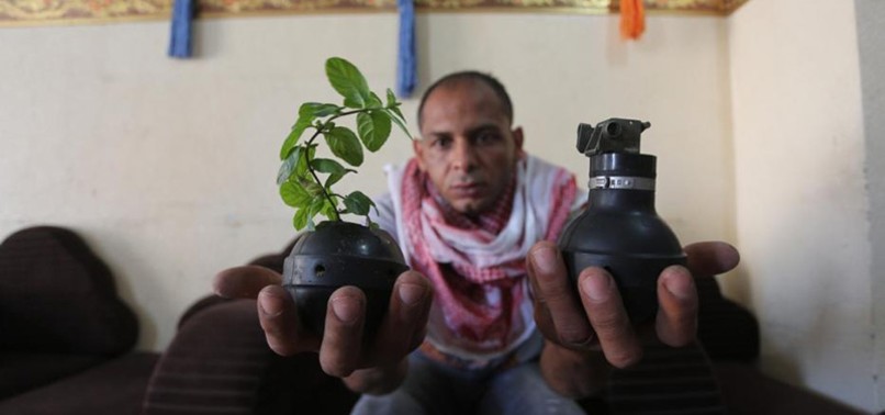 PALESTINIAN MAN TURNS GAS CANISTERS, BOMBS INTO PRAYER BEADS, PLANTERS