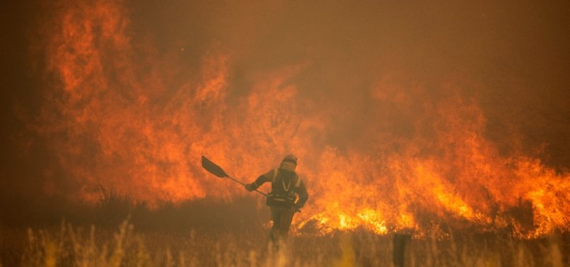 WILDFIRES RAGE IN PARTS OF NORTHERN HEMISPHERE AMID RECORD-BREAKING HEAT