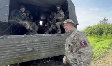 Russian mercenary boss slams army 'clowns' as he marks birthday at training camp
