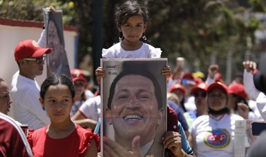 Venezuelans commemorate former President Hugo Chavez on 10th anniversary of his passing