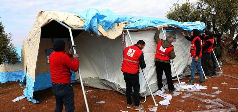 TURKISH RED CRESCENT HANDS OUT TENTS AND HEATERS TO IDLIB REFUGEES FLEEING DEADLY REGIME ATTACKS