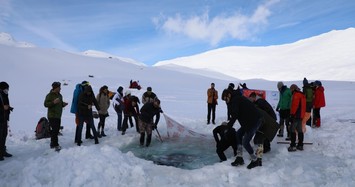 A fun act of bravery, swimmers dive into glacial lake in Turkey's Rize