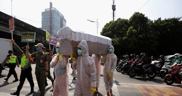 Indonesia uses fake coffin to punish COVID-19 violators