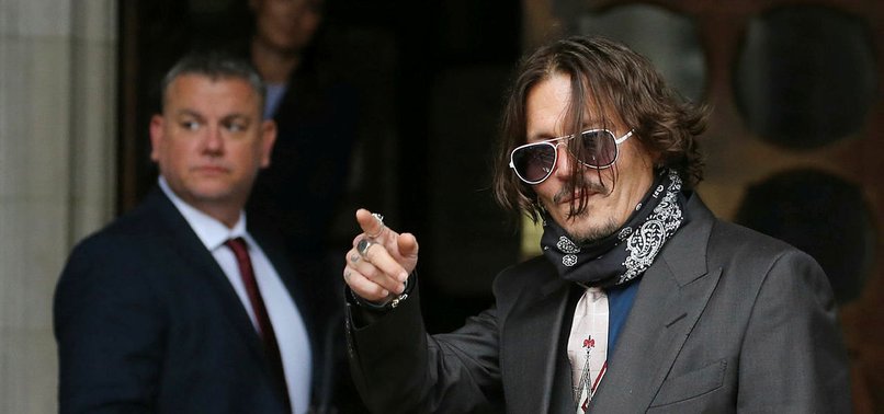 JOHNNY DEPP DENIES SLAPPING EX-WIFE