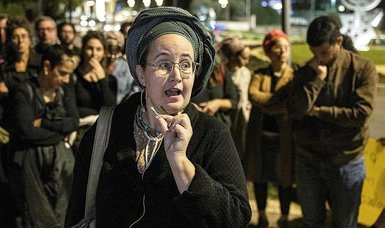 Israeli woman that accused top rabbi Zvi Thau of rape over several years stage protests outside of Knesset