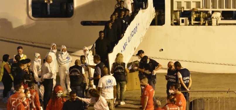 ITALY LETS STRANDED MIGRANTS LEAVE SHIP 10 DAYS AFTER RESCUE