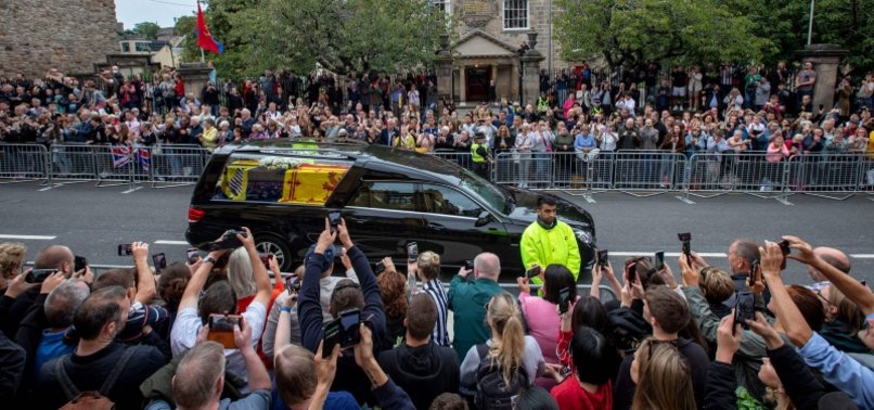 FEMALE PROTESTER ARRESTED FOR HOLDING ANTI-MONARCHY SIGN IN EDINBURGH