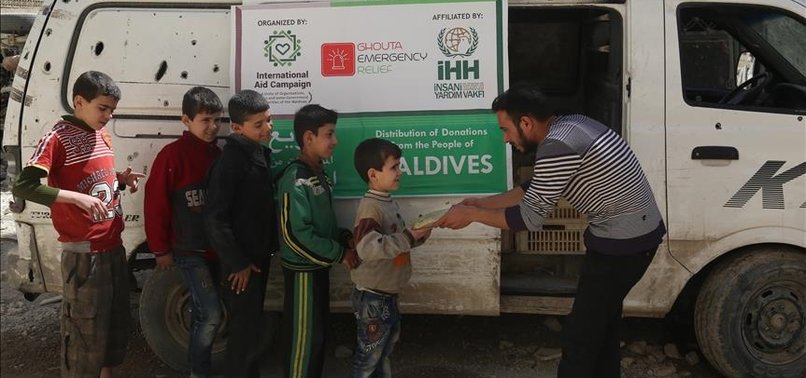 TURKISH AID AGENCY GIVES OUT HOT MEALS IN SYRIA’S DOUMA