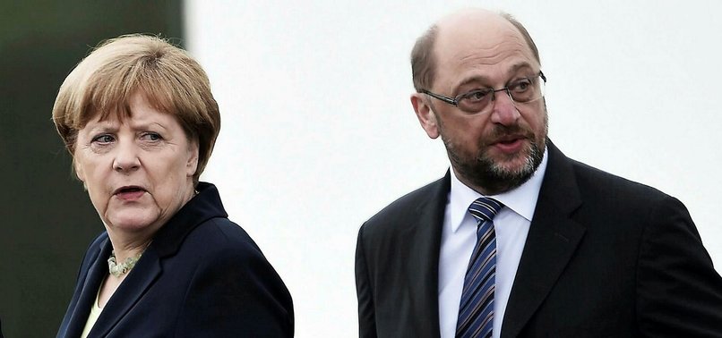 MERKELS CONSERVATIVE BLOC, SPD AGREE ON COALITION GOVERNMENT