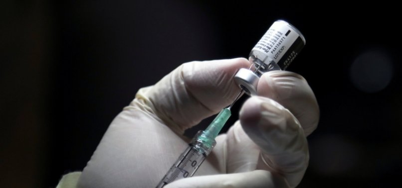 CANADIANS GETTING FIRST VACCINE DOSES