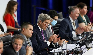 Kerry vows US to meet climate goal despite court setback